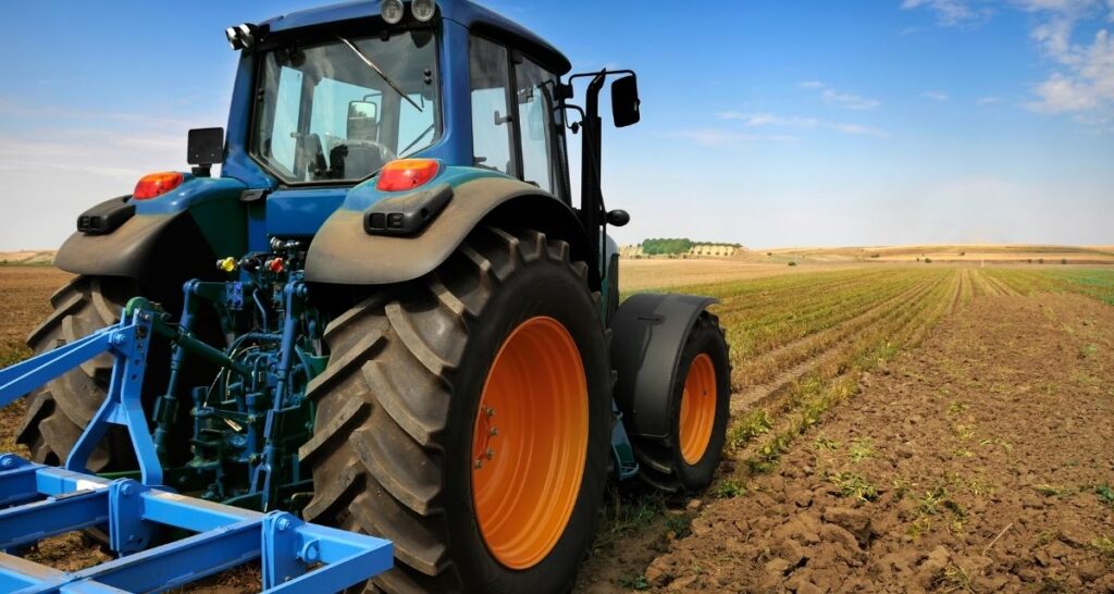 Tractor plowing a field
